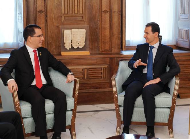 Assad- αυτό που συμβαίνει στη Βενεζουέλα μοιάζει με ό,τι έγινε στη Συρία. ΗΠΑ και σύμμαχοί τους θέλουν να επιβάλουν την ηγεμονία τους σε όσους διαφοροποιούνται και έχουν αυτονομία-