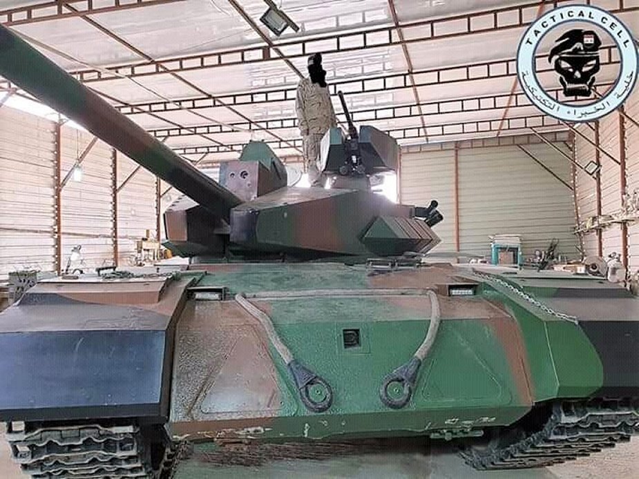 Iraq_unveils_indigenous_T-55_Al-Kafil-1_MBT_main_battle_tank_2