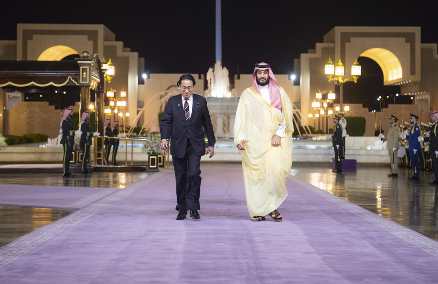 epa10750562 A handout photo made available by the Saudi Royal Palace shows Saudi Crown Prince Mohammed bin Salman (R) receiving Japanese Prime Minister Fumio Kishida (L) and holding an official reception ceremony at the Peace Palace, Jeddah, Saudi Arabia, 16 July 2023. Kishida is on a regional tour that will also take him to the United Arab Emirates and Qatar. EPA/Bandar Al-Jaloud / SAUDI ROYAL PALACE HANDOUT HANDOUT EDITORIAL USE ONLY/NO SALES