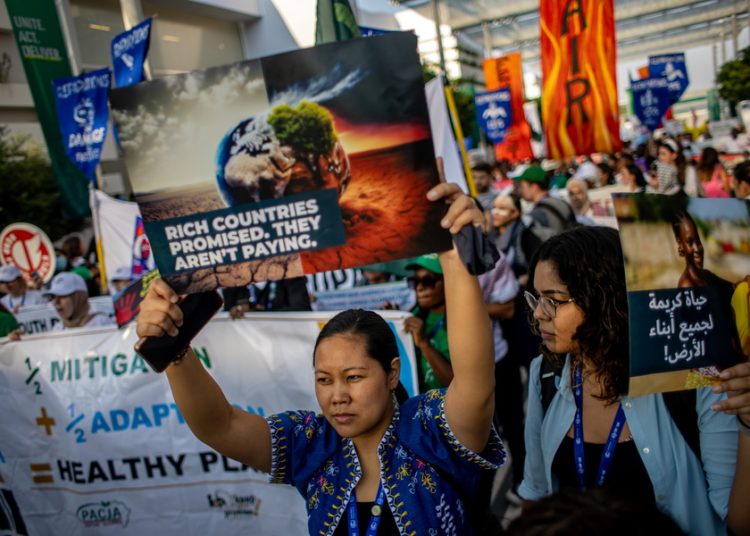 epa11018976 Activists take part in protest called Global March for Climate Justice and Ceasefire Now at Expo City Dubai, the venue of the 2023 United Nations Climate Change Conference (COP28), in Dubai, United Arab Emirates, 09 December 2023. According to organisers, 09 December is Global Day of Action for Climate Justice. Thousands people are expected to join demonstrations and events worldwide to demand climate justice. More than 300 actions are planned in 53 countries, including one at COP28. COP28 runs from 30 November to 12 December, and is expected to host one of the largest number of participants in the annual global climate conference as over 70,000 estimated attendees, including the member states of the UN Framework Convention on Climate Change (UNFCCC), business leaders, young people, climate scientists, Indigenous Peoples and other relevant stakeholders will attend. EPA/MARTIN DIVISEK