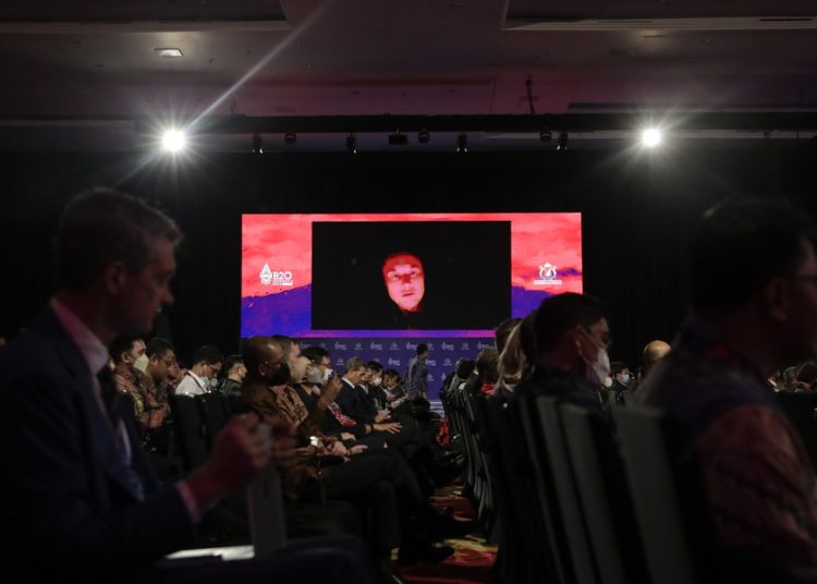 epa10304809 Tesla CEO Elon Musk speaks virtually during the B20 Summit Indonesia 2022 in Nusa Dua, Bali, Indonesia, 14 November 2022. Bali will host the 17th Group of 20 (G20) Heads of State and Government Summit from 15 to 16 November 2022. EPA/MAST IRHAM
