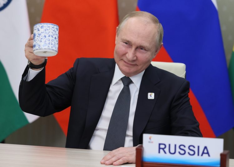 epa10032366 Russian President Vladimir Putin attends a BRICS Plus session involving the leaders of several invited states during the 14th BRICS summit in virtual format, via a video call at the Novo-Ogaryovo state residence, outside Moscow, Russia, 24 June 2022. EPA/MIKHAIL METZEL / KREMLIN / SPUTNIK / POOL MANDATORY CREDIT
