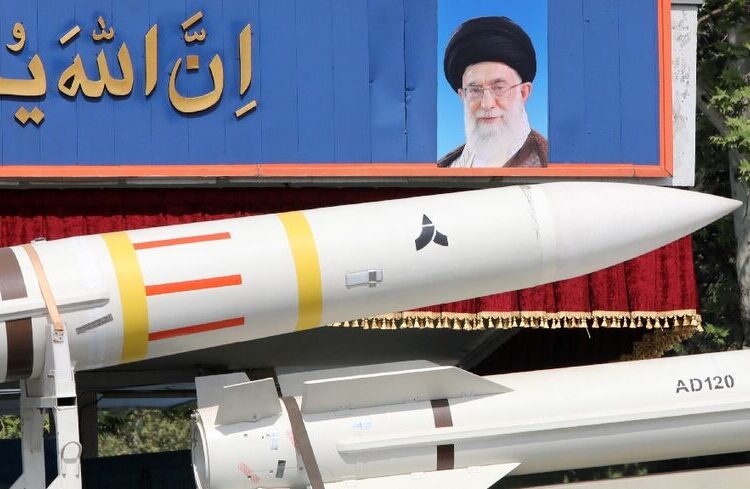 An Iranian military truck carries a Sayad 4-B missile past a portrait of supreme leader Ayatollah Ali Khamenei during a military parade on April 17, 2024 - AFP via Getty Images