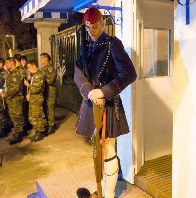 Unique posture of the presidential guard Evzone during an epitaphios procession on Holy Friday in Athens. Photo © Maria Theofanopoulou