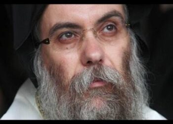 Ο Μητσοτάκης πριν φύγει για Βερολίνο έκανε ό,τι μπορούσε για να τιμωρήσει τον («Παπαφλέσσα» της Κρήτης) επίσκοπο Αμφιλόχιο, που είχε το θράσος να ξεμπροστιάσει τον….