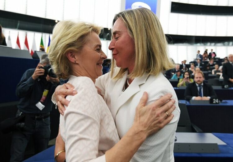 Newly elected European Commission President Ursula von der Leyen is congratulated by European Union High Representative for Foreign Affairs and Security Policy Federica Mogherini (R) after a vote on her election at the European Parliament in Strasbourg, eastern France on July 16, 2019. - German defence minister Ursula von der Leyen was narrowly elected president of the European Commission on July 16, after winning over sceptical lawmakers. The 60-year-old conservative was nominated to become the first woman in Brussels' top job last month by the leaders of the bloc's 28 member states, to the annoyance of many MEPs. (Photo by FREDERICK FLORIN / AFP)